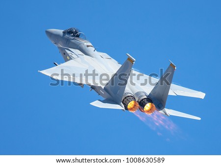 F-15 Eagle in a very close view, with afterburners on Royalty-Free Stock Photo #1008630589