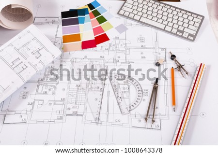 Workplace of architect. Engineering tools for creating new architectural project on table.