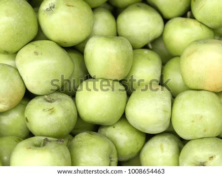 green apples harvest. green apples in packing tub at fruit warehouse.