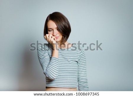 business woman embarrassed, shy, isolated on background, studio photo