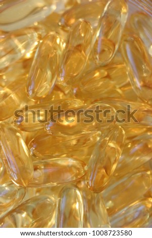 Olive capsules and syringe with white background, Omega 3 gel capsules on , Capsules of fish oil gel 