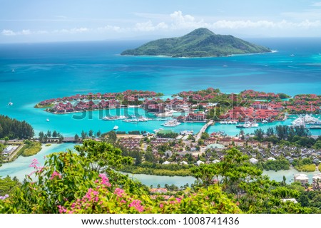 Red roofs of Eden Island, aerial view of Seychelles. Royalty-Free Stock Photo #1008741436