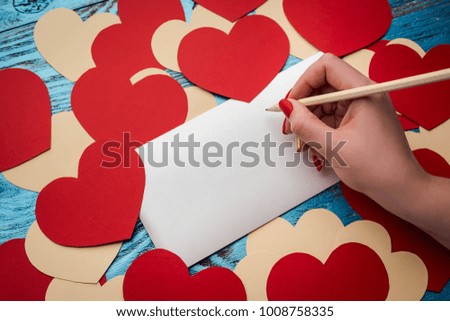 Valentines day background decorated with red hearts and love card/copy space
