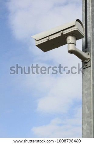 security camera on a metal pole no people stock photo 