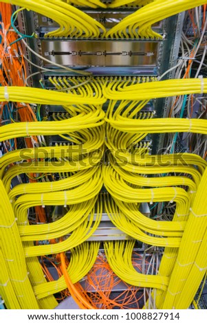Network cable on a network HUB Royalty-Free Stock Photo #1008827914