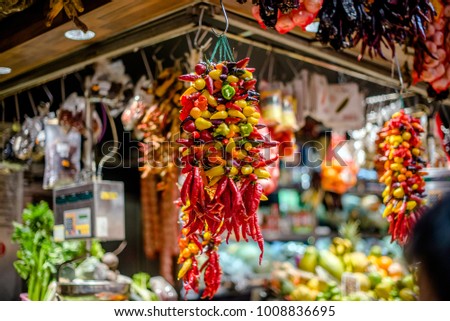 a bunch of hot peppers on the market in Spain 