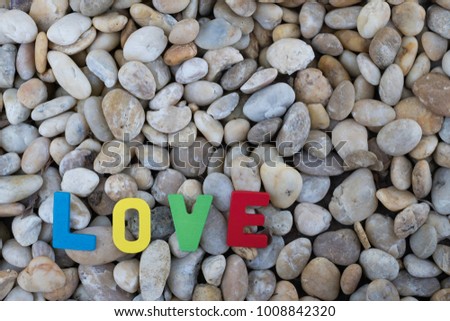 Word love on gravel background,happy valentine's day