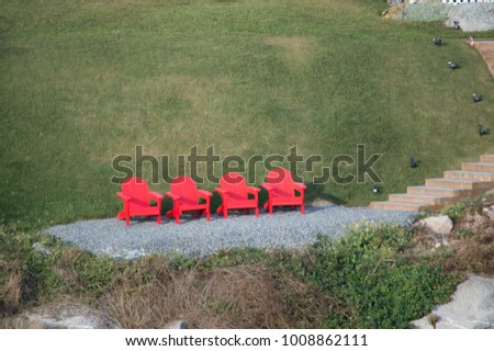 Four red chairs