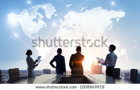 Discussing policy of international partnership. Mixed media Royalty-Free Stock Photo #1008869818