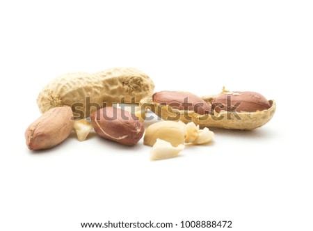 Peanuts (open, seeds, in husk, broken pieces, one whole) isolated on white background
