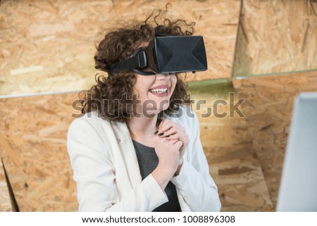 Girl using VR glasses having fun, concept