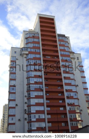 high-rise residential gray-red house