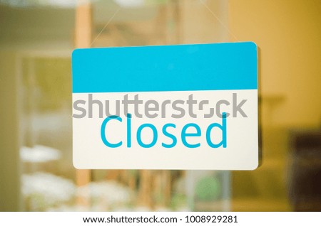 Sign closed hanging on the door.