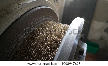 production of pellet for animals in a mill  Royalty-Free Stock Photo #1008947638