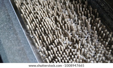 production of pellet for animals in a mill  Royalty-Free Stock Photo #1008947665