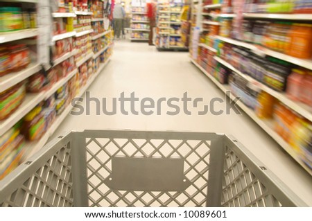 Shopping cart moving through market