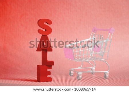 Sale colorful wooden text on blue background with copy space, shopping discount and marketing concept idea. template for add text or photo.