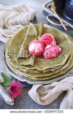 Matcha green tea pancakes (blinis) and three balls of fruit ice cream dressing