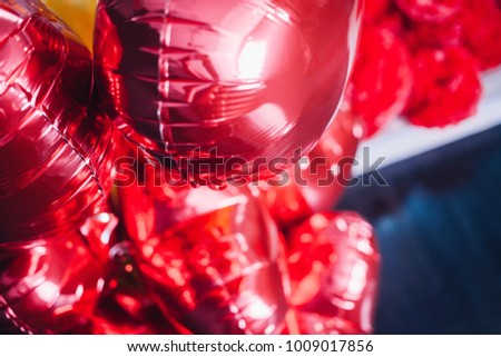 Red heart balloons in a black background, valentines day