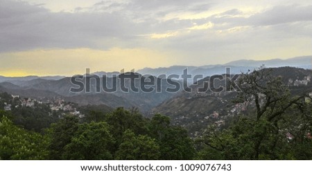 Mountain View of Trees and Clouds
