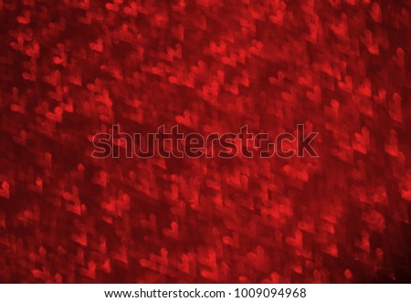 Valentine's day romantic glitter bokeh background with many hearts lights