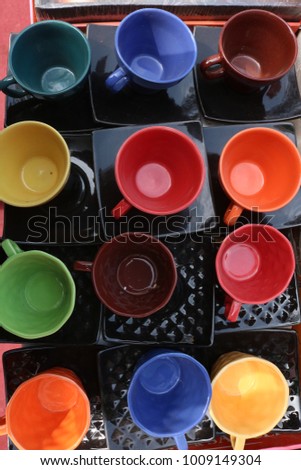 group of colorful ceramic teacups