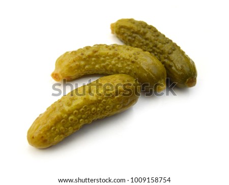 Pickled cucumbers. Gherkins on a white background