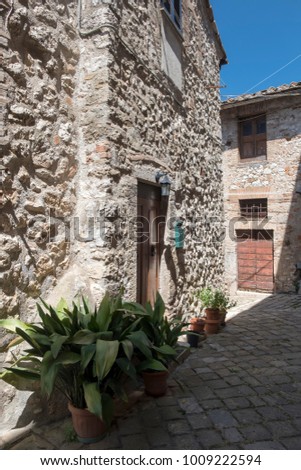 Historic town of Lugnano in Teverina (Terni, Umbria, Italy) at summer. Old typical street
