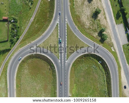 Symmetrical road top view - Motorway aerial photo - Roads development drone photo