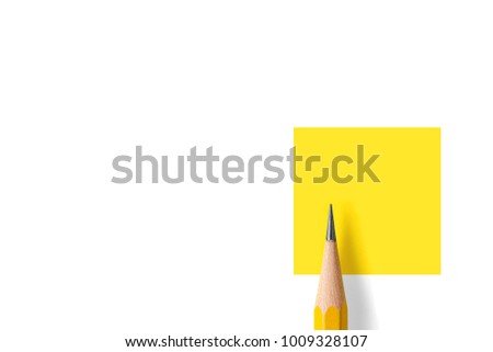 Minimalist template with copy space by top view close up macro photo of wooden yellow pencil isolated on white texture paper and combine with yellow square. Flash light made smooth shadow from pencil. Royalty-Free Stock Photo #1009328107