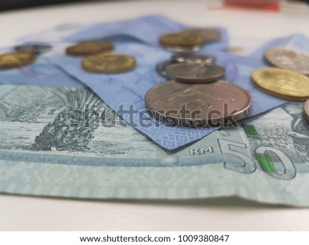photo of Malaysia bank notes and coins