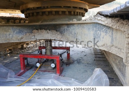 Soil bearing capacity test by Plate load test during applied force and settlement reading Royalty-Free Stock Photo #1009410583