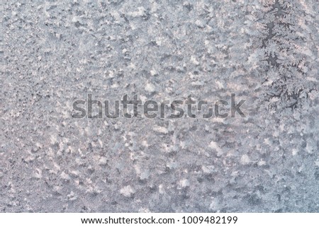 Ice on glass texture background. Cold climate of frost.