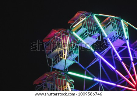 Carnival Vintage Colorful lights Farris Wheels Ride at Night