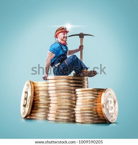 Miner man posing with a golden bitcoin stacks of coins on a background. Virtual cryptocurrency concept.
