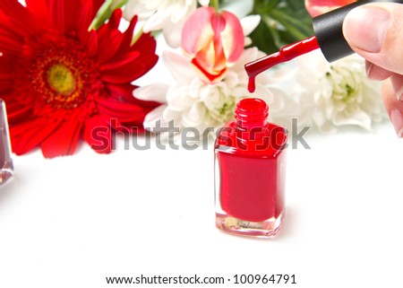 red nail polish with flower