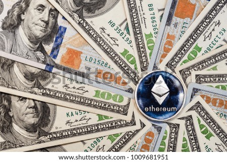 Ethereum crypto currency on dollar notes