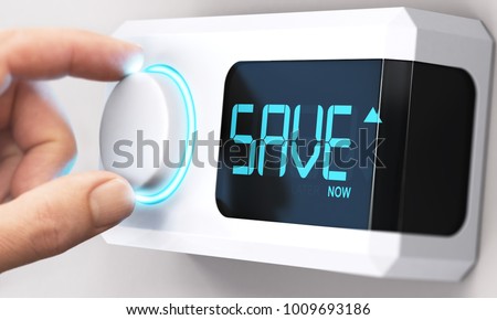 Hand turning a thermostat knob to increase savings by decreasing energy consumption. Composite image between a hand photography and a 3D background. Royalty-Free Stock Photo #1009693186