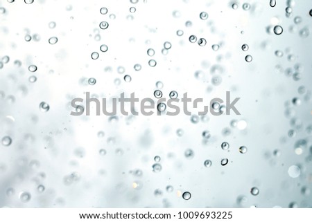 Falling transparent water drops.