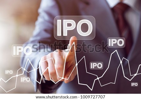 Businessman presses button ipo Initial Public Offering diagram online network. Royalty-Free Stock Photo #1009727707