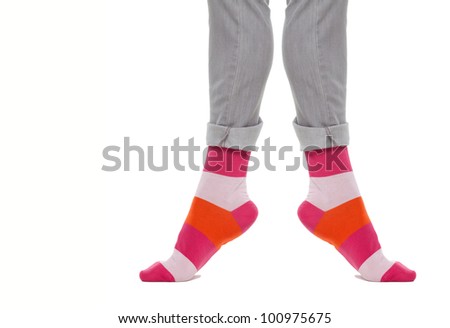 Legs in colorful striped socks