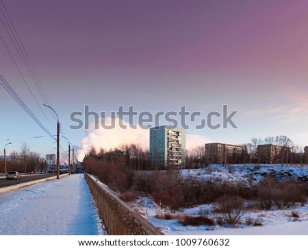 Sunset in the city in the winter