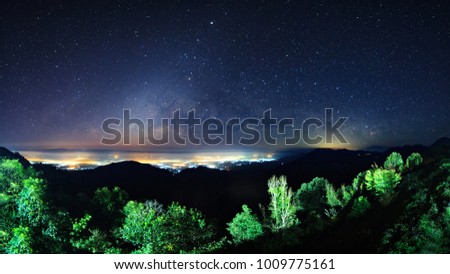 Starry night sky at Monson viewpoint Doi AngKhang and milky way galaxy with stars and space dust in the universe