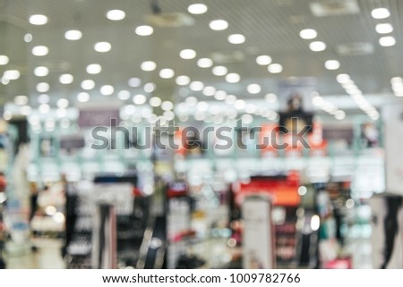 Shopping center inside, shopping-windows in big city mall, shopping concept, shopping mall background, blurred photo, sales, discounts.