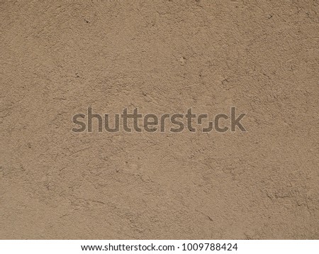 Japanese traditional hard textured clay wall background photograph. Traditional style of wall in Japan, now popular again for its aesthetic qualities. Exterior wall with authentic texture.