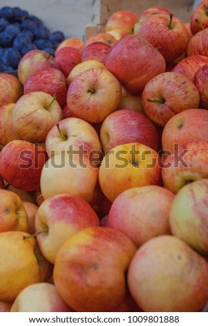 Closeup shot of fresh red and yellow apples