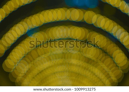  Yellow and blue arc shape Abstract Bokeh Background.golden bokeh lights defocused, abstract background, large polygons, bokeh arc