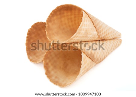 three wafer ice cream cones on white background