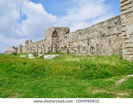 Castle Methoni is a village and a former municipality in Messenia, Peloponnese, Greece, with church and fortification tower                                