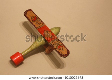 An ancient wooden toy aircraft of the early 20th century, the Soviet era. On the wing inscription "USSR"